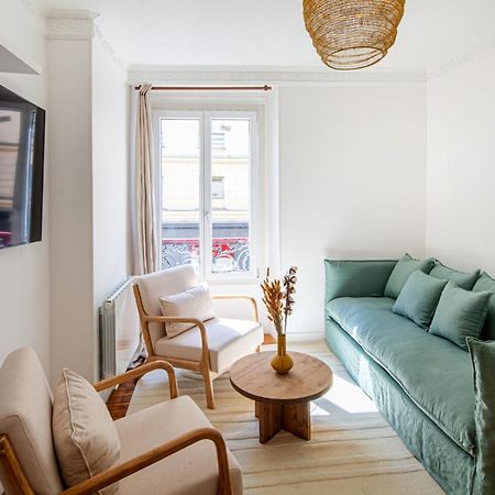 Appartamento Eiffel Tower Rue Cler Parigi Esterno foto