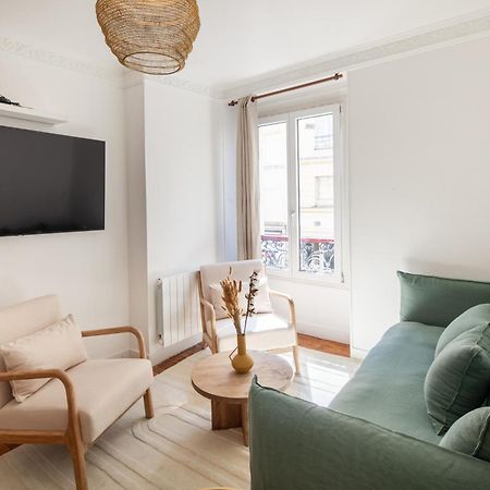Appartamento Eiffel Tower Rue Cler Parigi Esterno foto